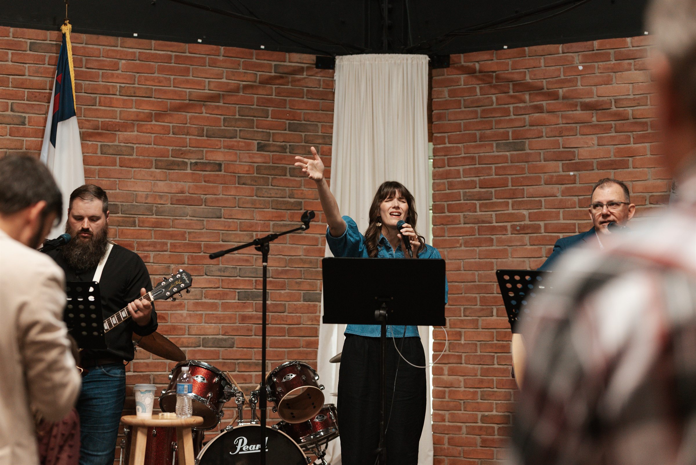 The worship team leading a Sunday gathering at United With Christ Church, Auburn